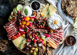 Nibble and graze: Where to order impressive cheese and charcuterie platters in Singapore for your next house party featured image
